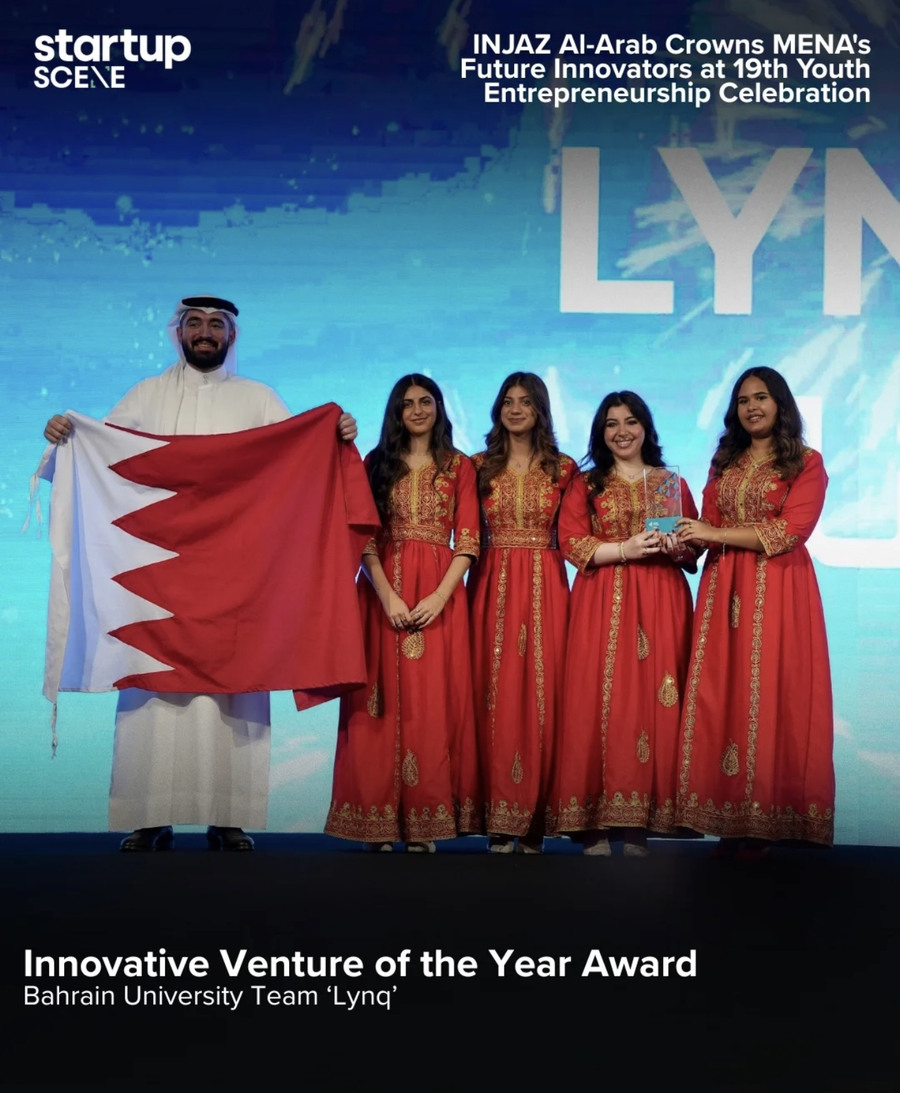 Receiving the award on stage at the INJAZ Al-Arab celebration